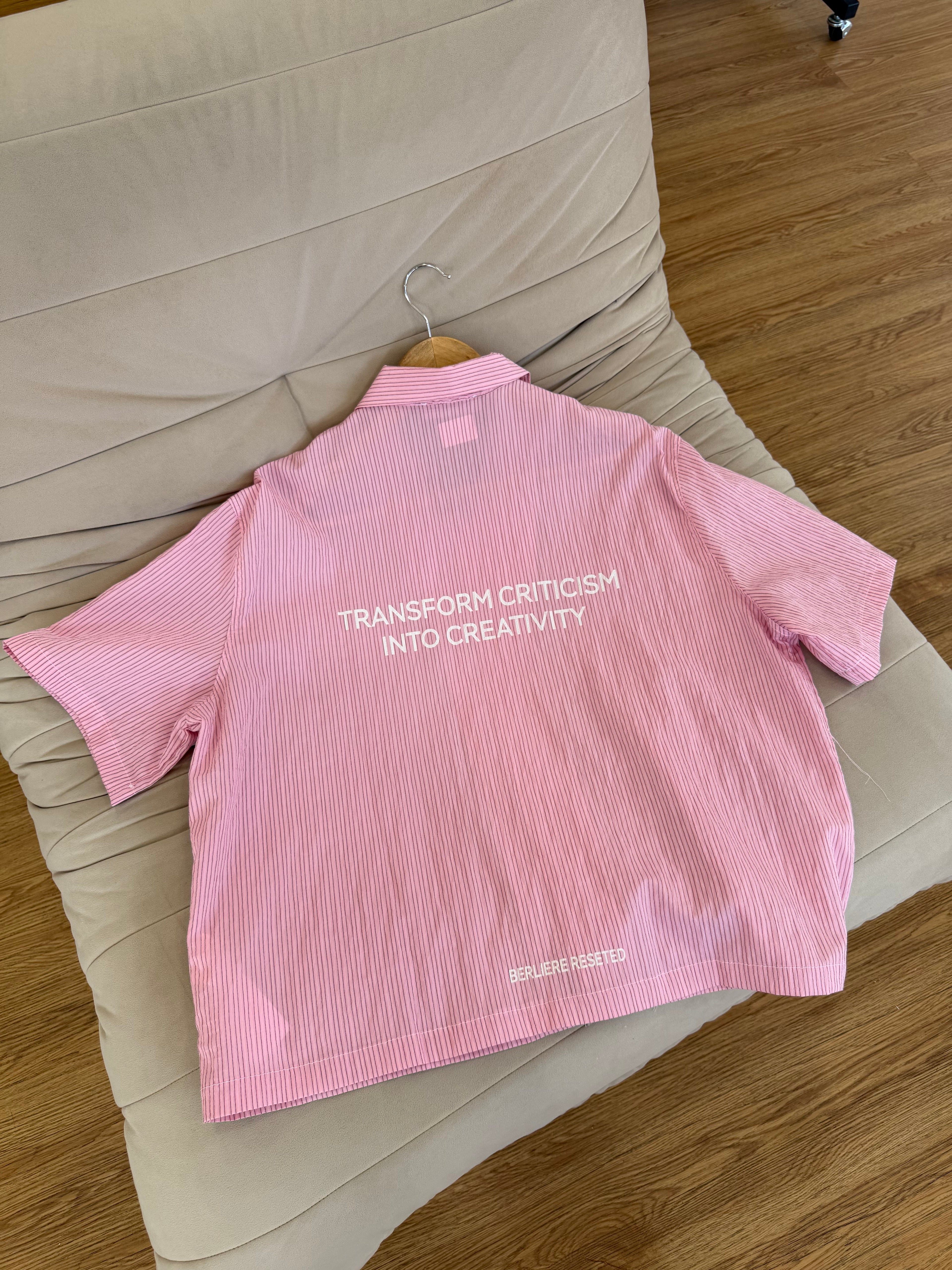 Black striped pink shirt