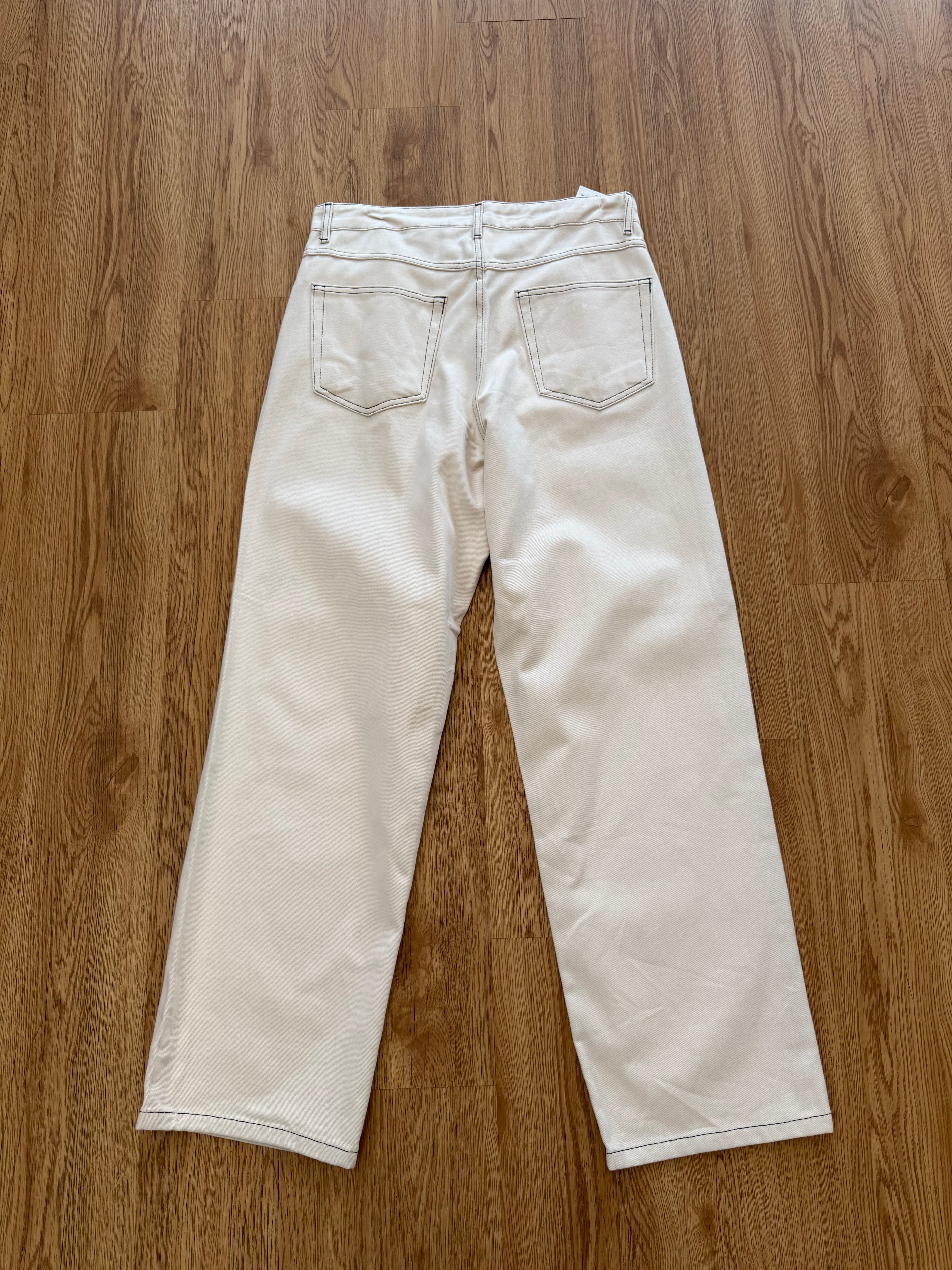 Black stitched jeans