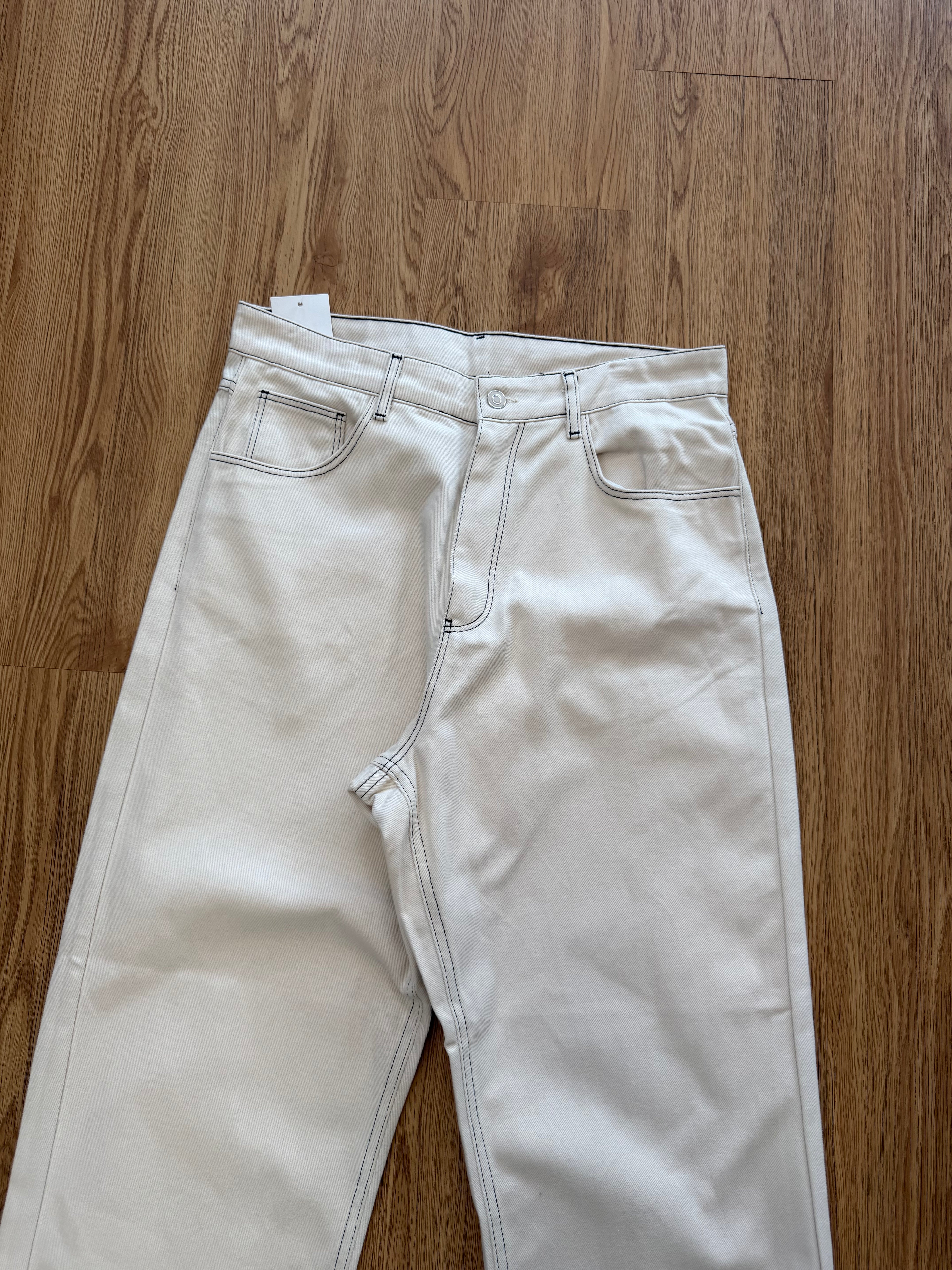 Black stitched jeans